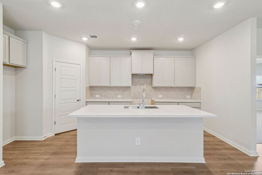 Furnished interior view inside a new home in Estancia Ranch - Premier Series, San Antonio (Image 8). Furnished interior view inside a new home in Estancia Ranch - Premier Series, San Antonio (Image 8).