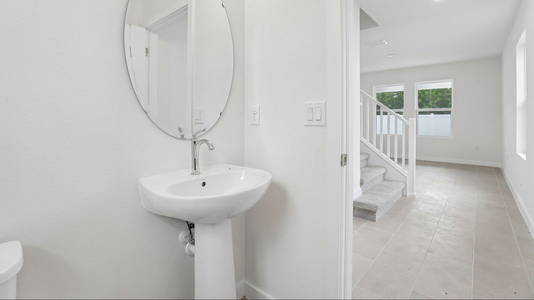 Furnished interior view inside a new home in Cyrene at Harmony, St. Cloud (Image 40).