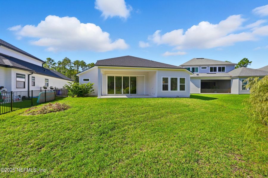 Exterior details and patio area of a home in West End at Town Center, Ponte Vedra (Image 28). Exterior details and patio area of a home in West End at Town Center, Ponte Vedra (Image 28).