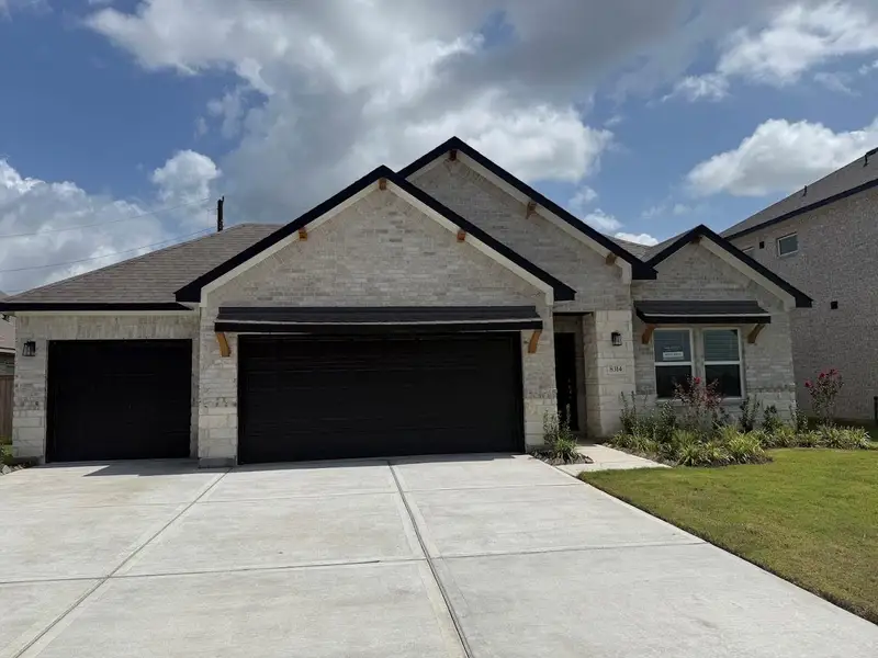 Front exterior of a new home in Ashland, Angleton, TX, highlighting curb appeal (Image 1). Front exterior of a new home in Ashland, Angleton, TX, highlighting curb appeal (Image 1).