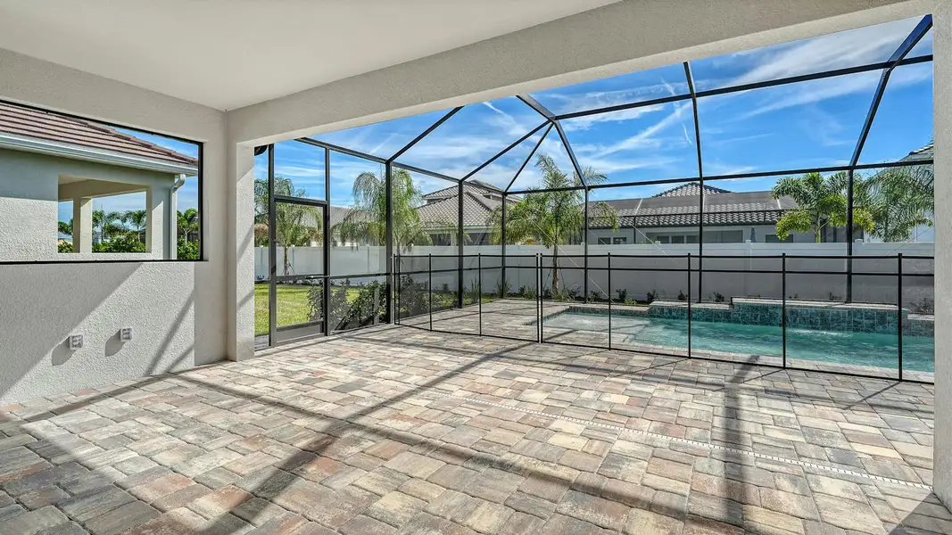 Exterior details and patio area of a home in Windward Real Estate and Homes for Sale in Sarasota, FL - Neal Communities, Lakewood Ranch (Image 3).