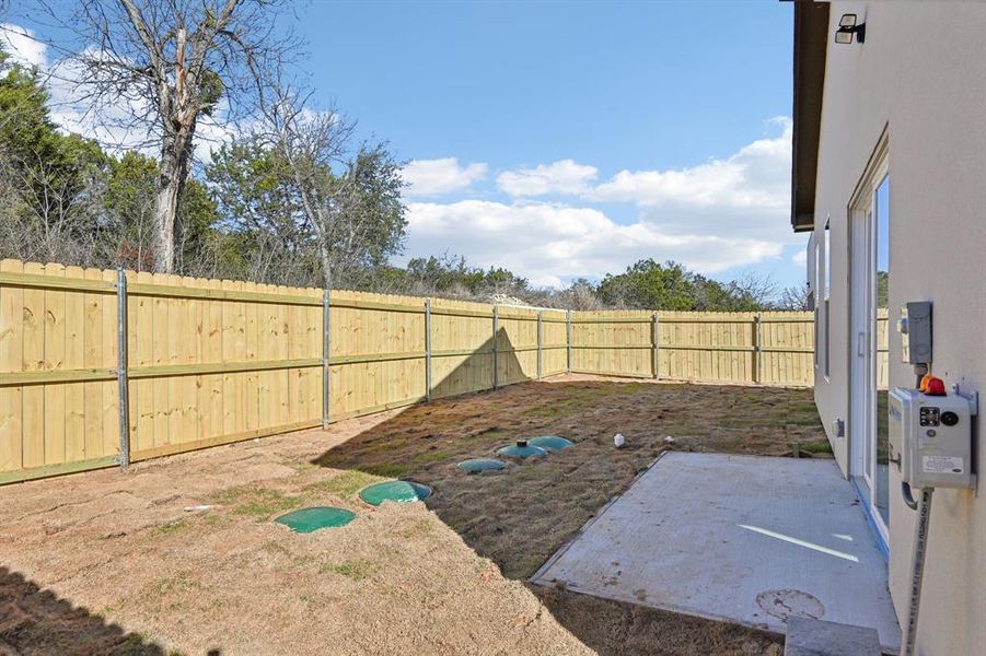 View of yard featuring a fenced backyard