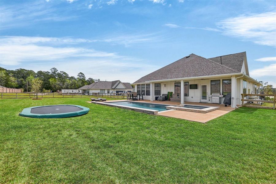 Exterior details and patio area of a home in Lone Star Landing, Montgomery (Image 25).