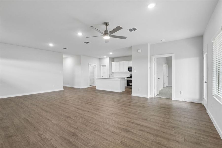 Open Floor Plan in the Oscar home plan by Trophy Signature Homes – REPRESENTATIVE PHOTO