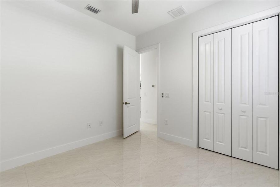 Spacious, unfurnished interior of a new home in , Port Charlotte (Image 15).