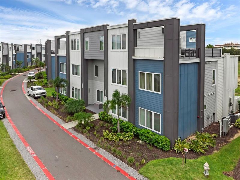 Front exterior of a new home in , Kissimmee, FL, highlighting curb appeal (Image 2).