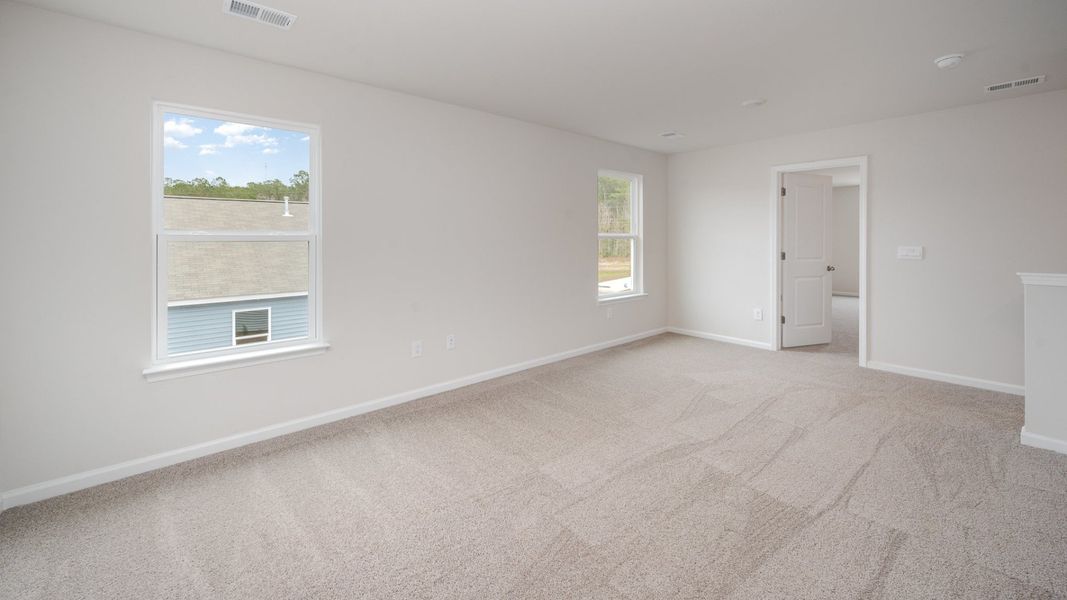 Representative unfurnished interior of a home built from the WREN by D.R. Horton in Sidbury Station, Castle Hayne (Image 18).