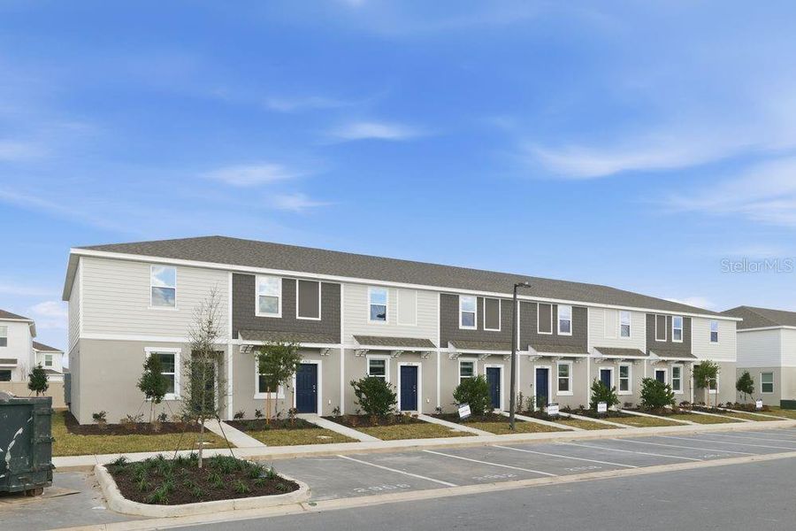 Front exterior of a new home in Westview Community Group Page, Kissimmee, FL, highlighting curb appeal (Image 16). Front exterior of a new home in Westview Community Group Page, Kissimmee, FL, highlighting curb appeal (Image 16).