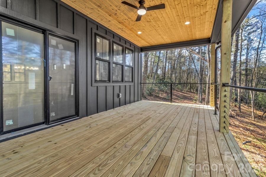Exterior details and patio area of a home in , Mills River (Image 23).