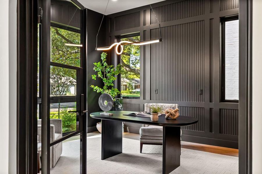 Home office featuring wood finished floors Home office featuring wood finished floors