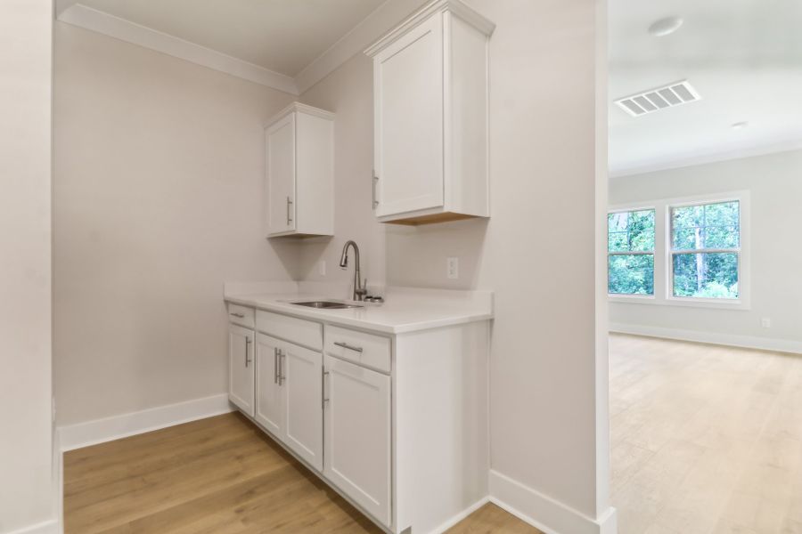 Representative furnished interior of a home built from the Connor II by Great Southern Homes in Edwards Ridge, Central (Image 9).