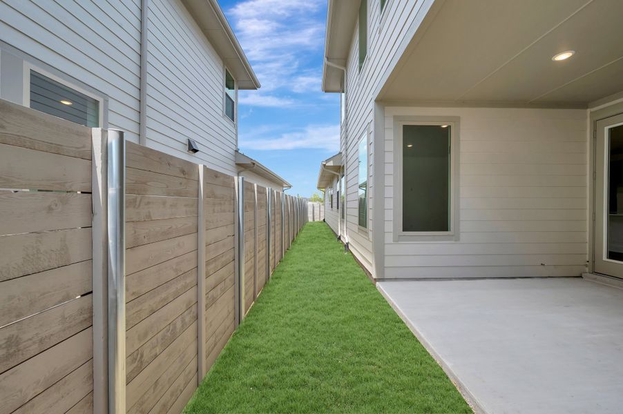 Exterior details and patio area of a home in Painted Tree, McKinney (Image 4).