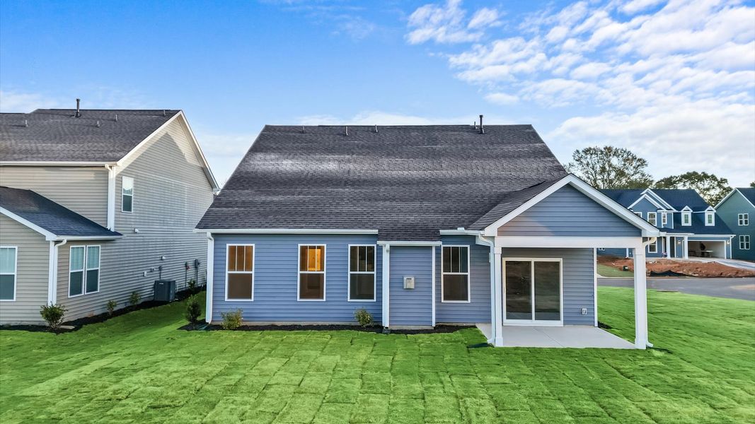 Exclusive rear covered porch with accomplished detail and elevated outdoor living potential