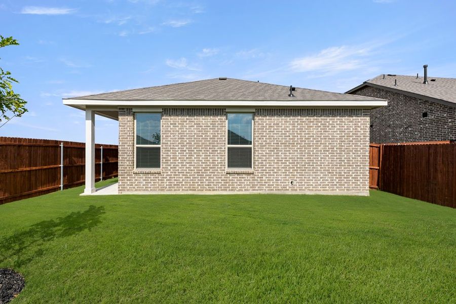 Front exterior of a new home in Northspur, Terrell, TX, highlighting curb appeal (Image 27). Front exterior of a new home in Northspur, Terrell, TX, highlighting curb appeal (Image 27).
