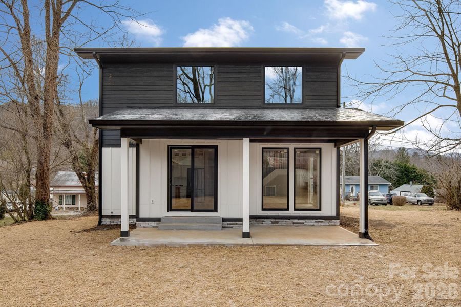 Exterior details and patio area of a home in , Black Mountain (Image 25).