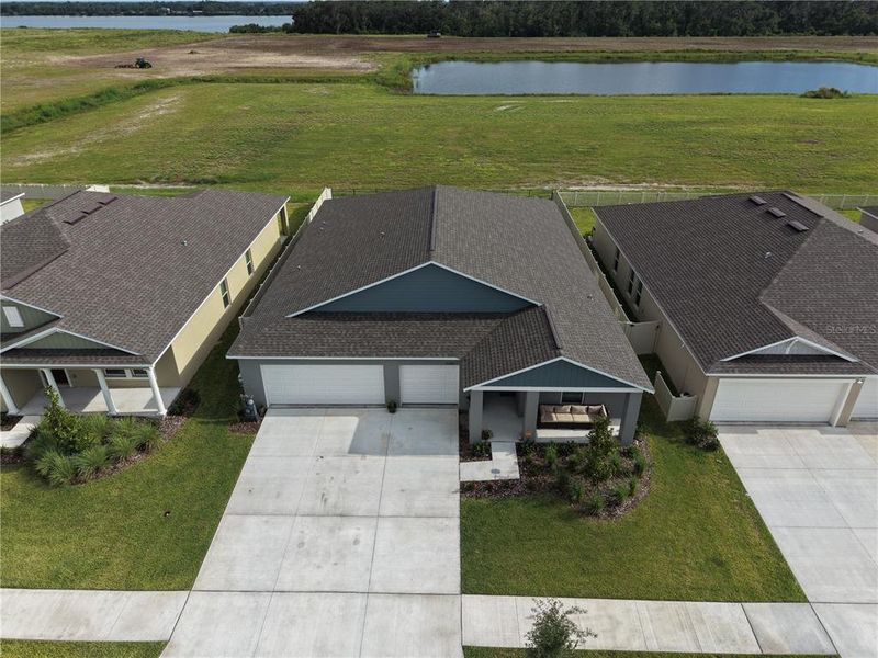 Front exterior of a new home in , Wimauma, FL, highlighting curb appeal (Image 24).