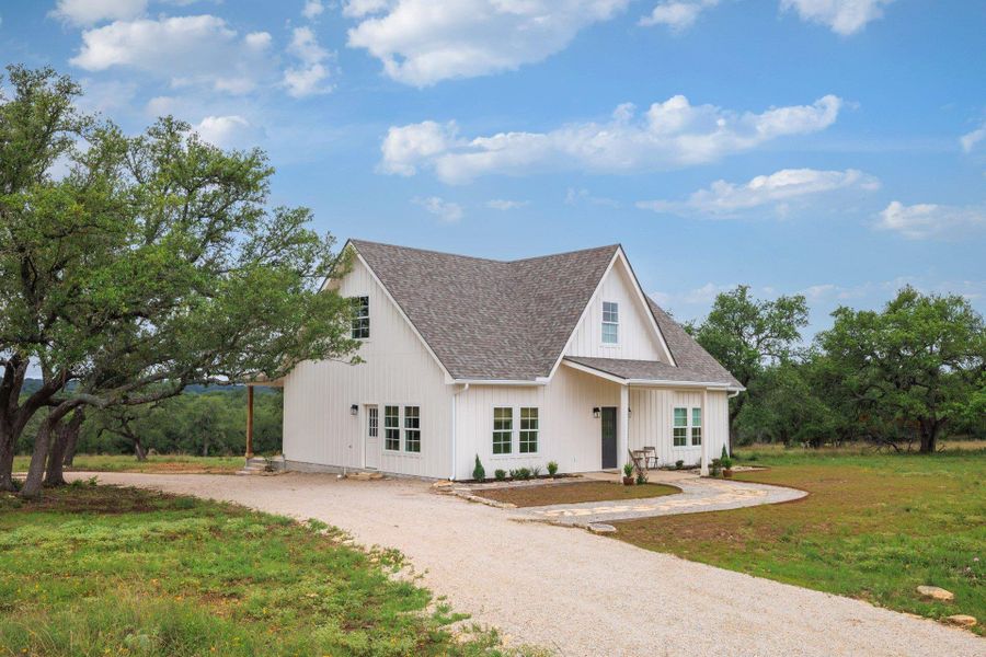 Front exterior of a new home in , Blanco, TX, highlighting curb appeal (Image 24). Front exterior of a new home in , Blanco, TX, highlighting curb appeal (Image 24).