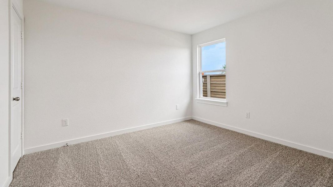 Spacious, unfurnished interior of a new home in Monarch Ranch, Manor (Image 22).