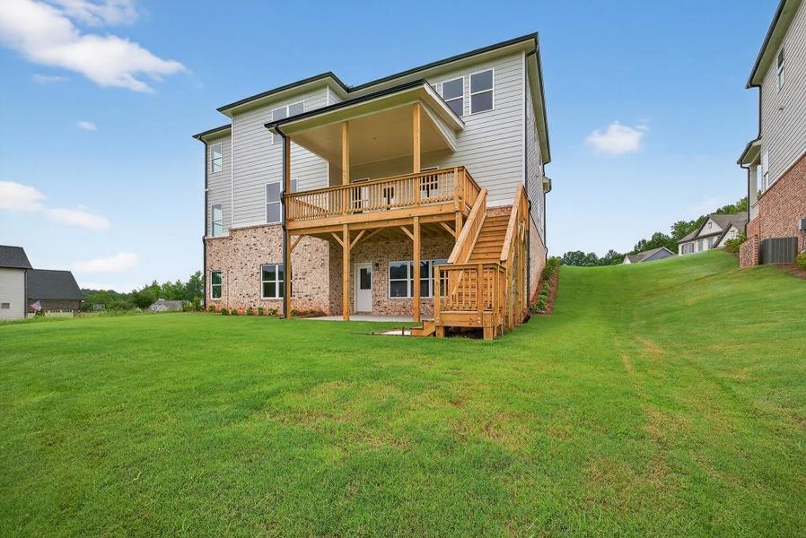 Front exterior of a new home in Traditions Of Braselton, Jefferson, GA, highlighting curb appeal (Image 22). Front exterior of a new home in Traditions Of Braselton, Jefferson, GA, highlighting curb appeal (Image 22).
