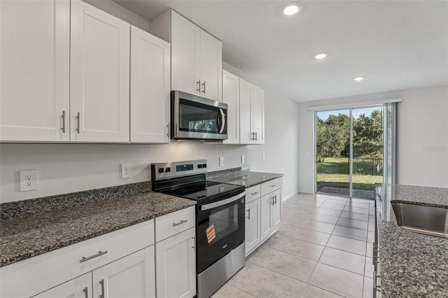 Furnished interior view inside a new home in Bradbury Creek - Signature Series, Haines City (Image 27).