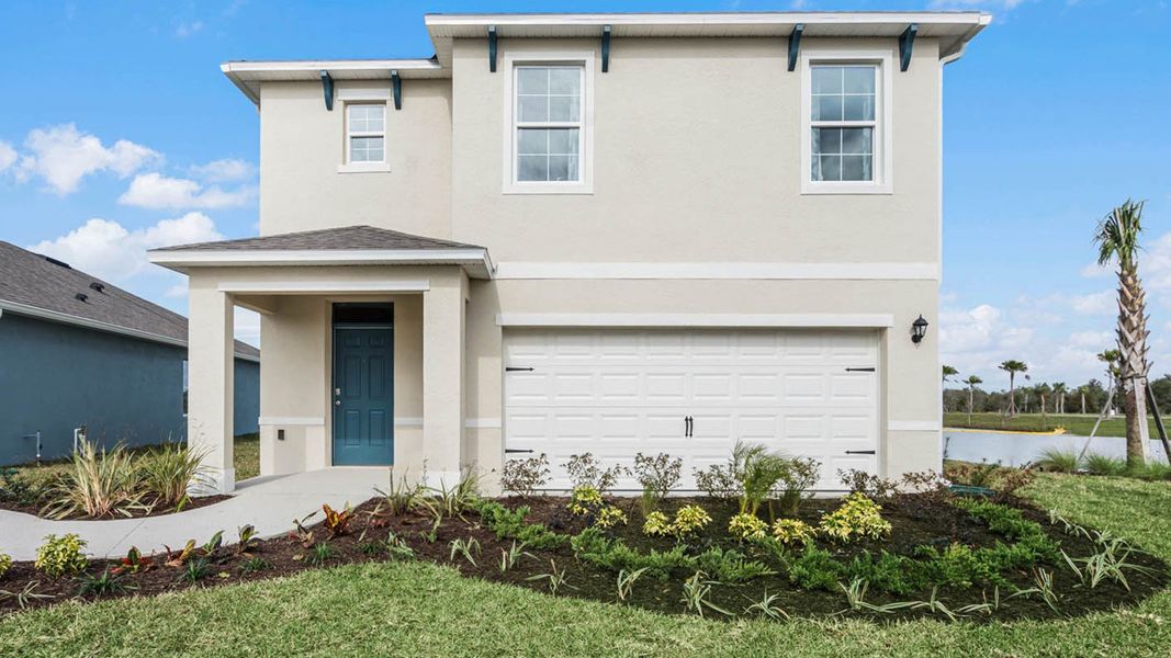 Front exterior of a new home in Cascades, Davenport, FL, highlighting curb appeal (Image 1). Front exterior of a new home in Cascades, Davenport, FL, highlighting curb appeal (Image 1).