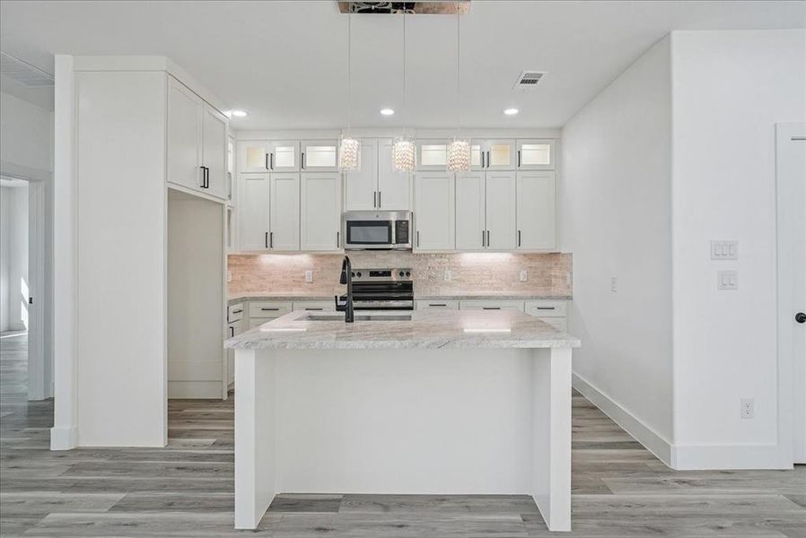 Furnished interior view inside a new home in , Dallas (Image 6). Furnished interior view inside a new home in , Dallas (Image 6).