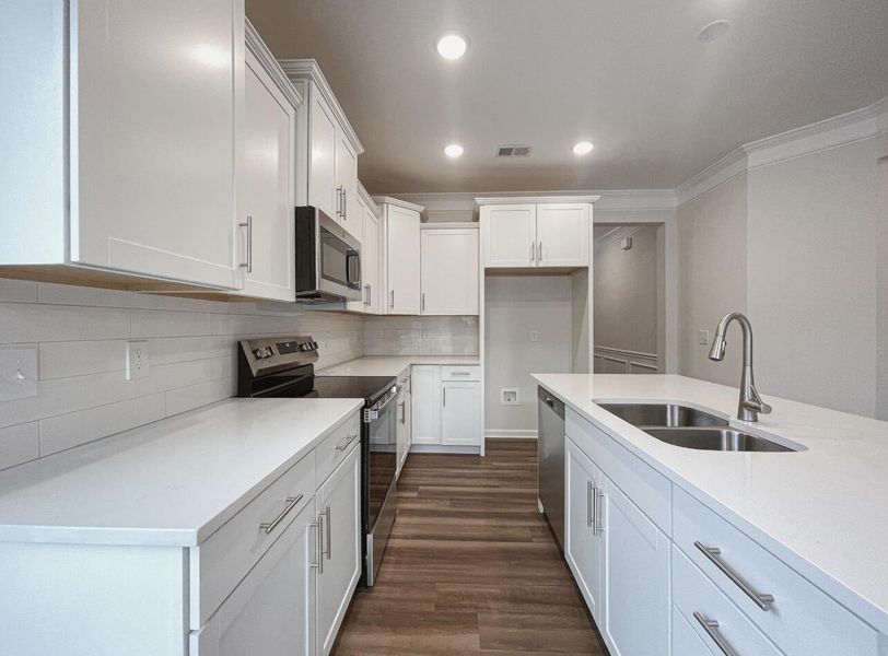 Furnished interior view inside a new home in East Main Townes, Spartanburg (Image 7).