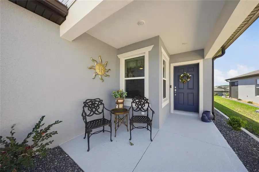 Exterior details and patio area of a home in Del Webb Stone Creek, Ocala (Image 3).