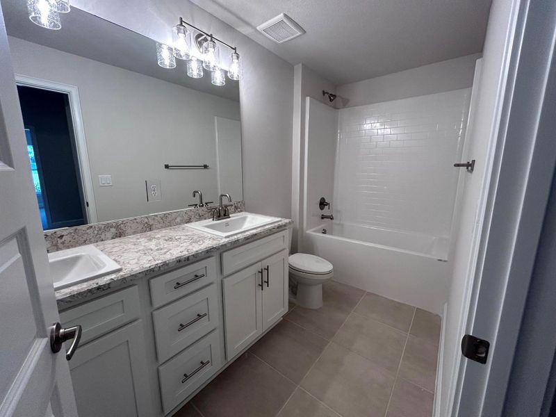 Furnished interior view inside a new home in Waterstone Villas, Fort Pierce (Image 8). Furnished interior view inside a new home in Waterstone Villas, Fort Pierce (Image 8).