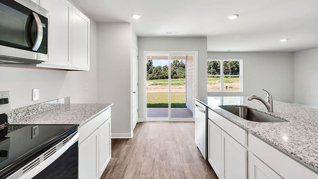 Furnished interior view inside a new home in Vineyard Trail, Jacksonville (Image 7).