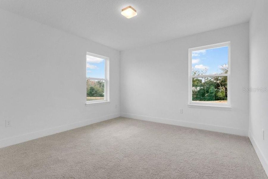 Spacious, unfurnished interior of a new home in Yucatan Gardens, Orlando (Image 20).