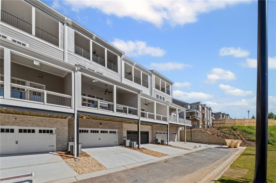 Exterior details and patio area of a home in South on Main, Woodstock (Image 30).