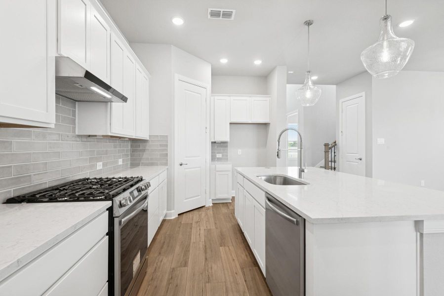Furnished interior view inside a new home in Riceland 50’ Alley Load Homesites, Mont Belvieu (Image 2).