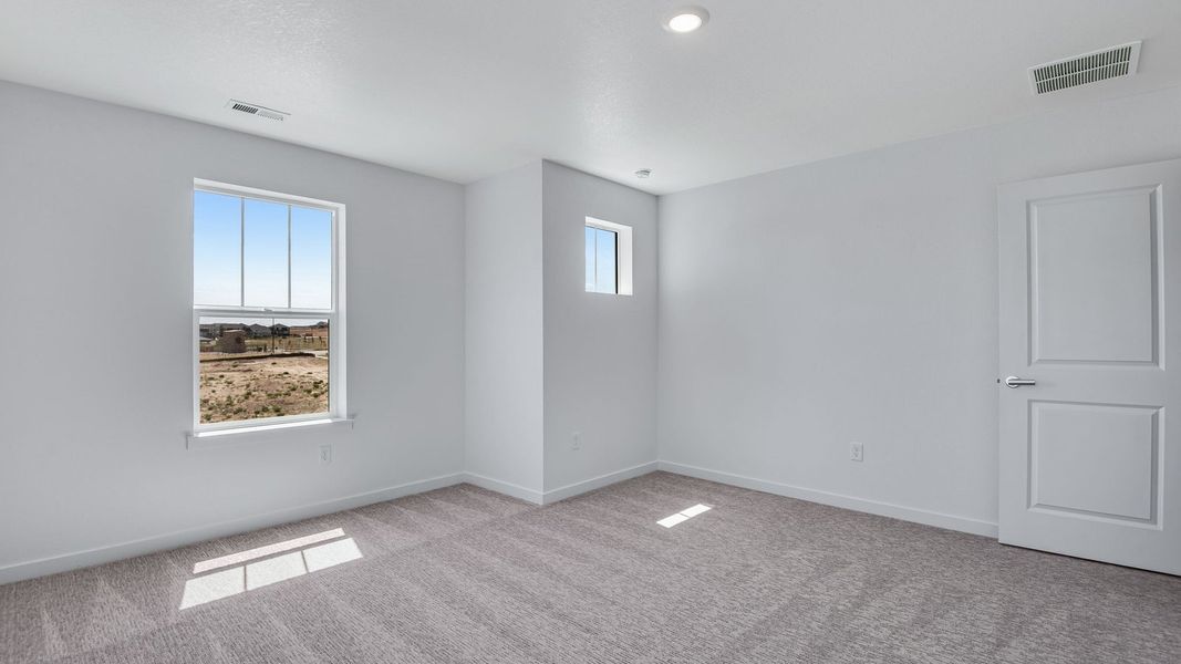 Spacious, unfurnished interior of a new home in Trails at Crowfoot, Parker (Image 44).
