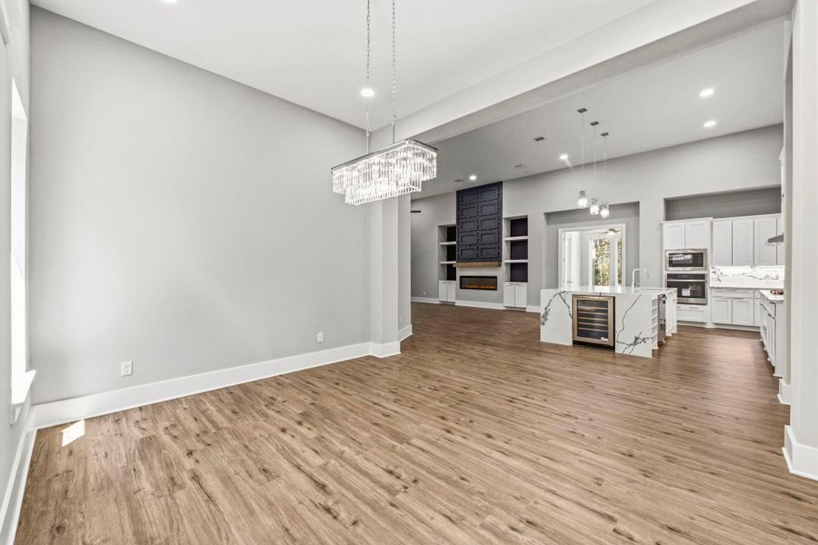 Open to the kitchen and living area, the dining room keeps guests connected while entertaining.