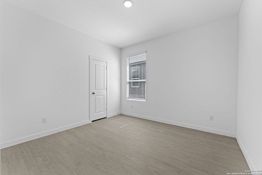 Spacious, unfurnished interior of a new home in Waterwheel: Coastline Collection, San Antonio (Image 9).