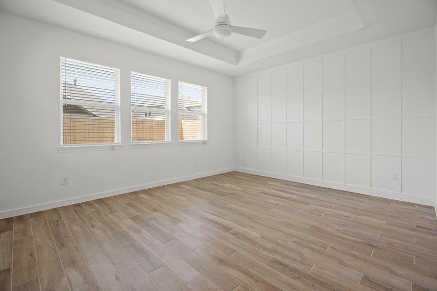 Spacious primary suite with feature wall (*Photo not of actual home and used for illustration purposes only.) Spacious primary suite with feature wall (*Photo not of actual home and used for illustration purposes only.)