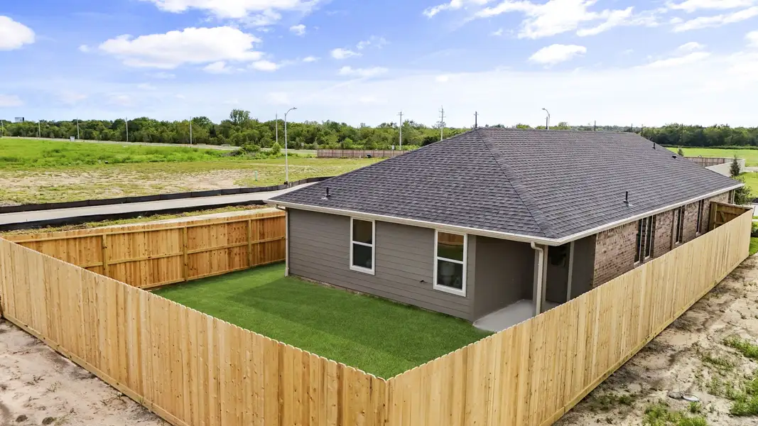 Exterior details and patio area of a home in Emberly, Beasley (Image 3).