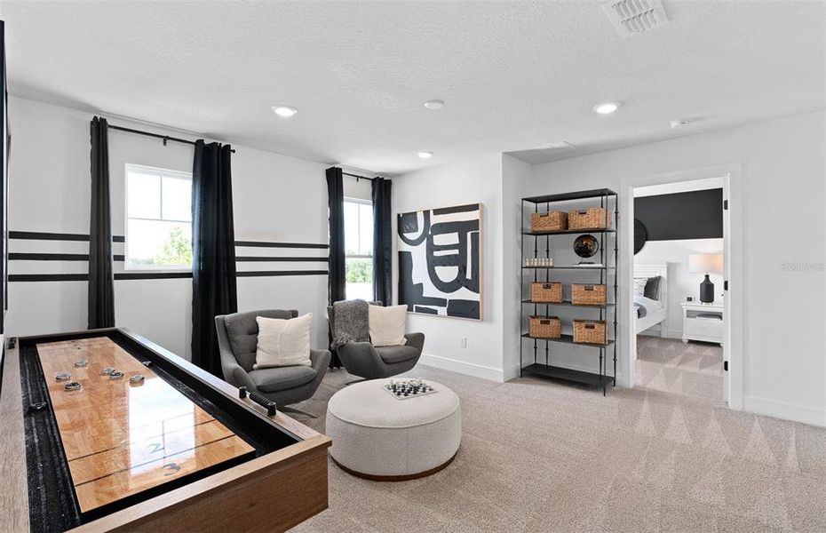 Furnished interior view inside a new home in Waterstone at Halifax Plantation, Ormond Beach (Image 8).