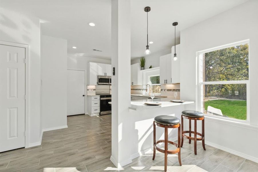 Kitchen with bar seating