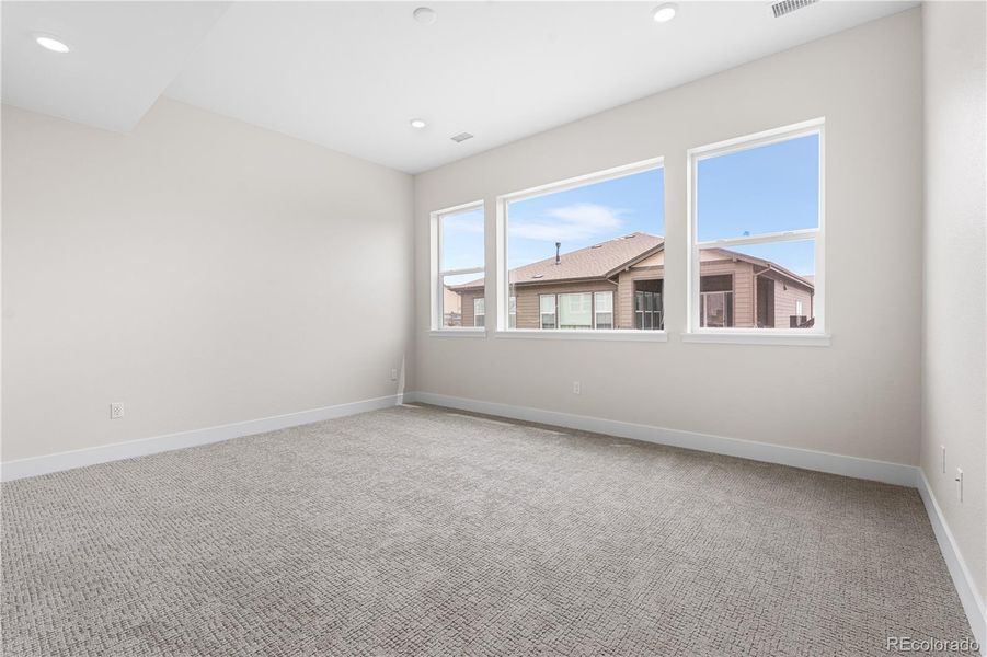 Spacious, unfurnished interior of a new home in Retreat at The Canyons, Castle Pines (Image 21).