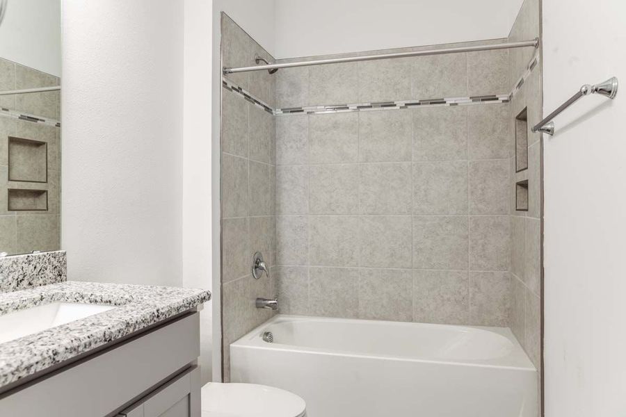 Representative furnished interior of a home built from the Flora by William Ryan Homes in The Sanctuary – Coastal Collection, Punta Gorda (Image 13). Representative furnished interior of a home built from the Flora by William Ryan Homes in The Sanctuary – Coastal Collection, Punta Gorda (Image 13).