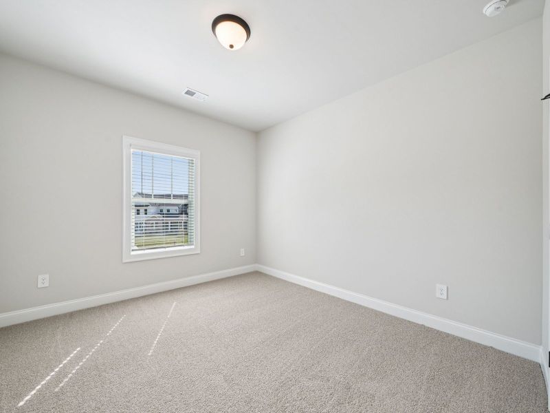 Spacious, unfurnished interior of a new home in Vines at Mill Creek - Legacy Series, Braselton (Image 18).