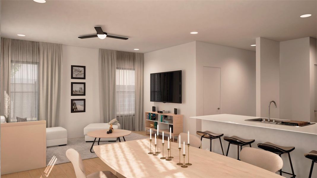 Dining area with recessed lighting and light wood finished floors