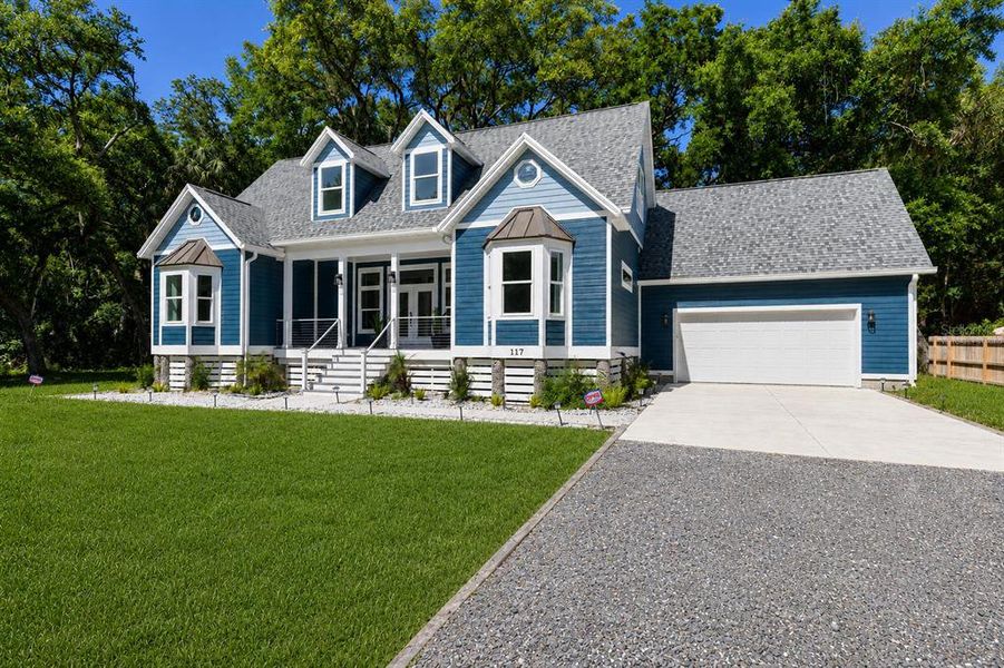 Front exterior of a new home in , Palm Coast, FL, highlighting curb appeal (Image 27). Front exterior of a new home in , Palm Coast, FL, highlighting curb appeal (Image 27).