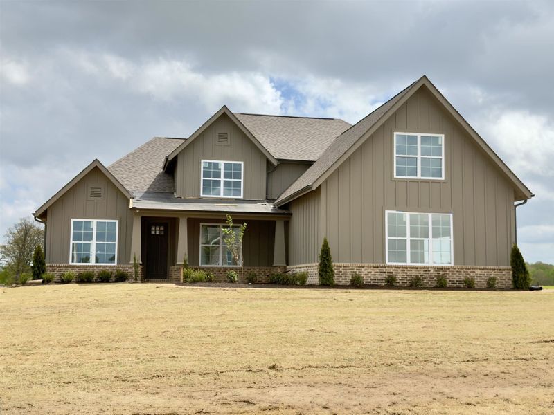Front exterior of a new home in White Oak, Arlington, TN, highlighting curb appeal (Image 1). Front exterior of a new home in White Oak, Arlington, TN, highlighting curb appeal (Image 1).