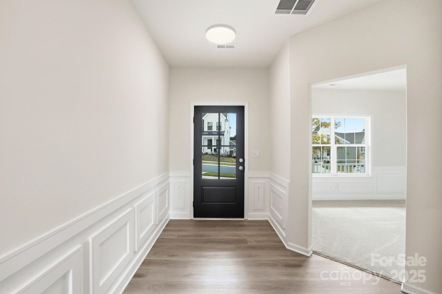 . As you step inside, you are immediately greeted by an open-concept floor plan defined by soaring ceilings and an abundance of natural light streaming through oversized windows that frame the spectacular water views . As you step inside, you are immediately greeted by an open-concept floor plan defined by soaring ceilings and an abundance of natural light streaming through oversized windows that frame the spectacular water views