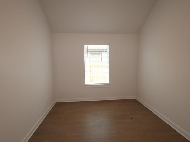 Spacious, unfurnished interior of a new home in Pinewood at Grand Texas, New Caney (Image 8).