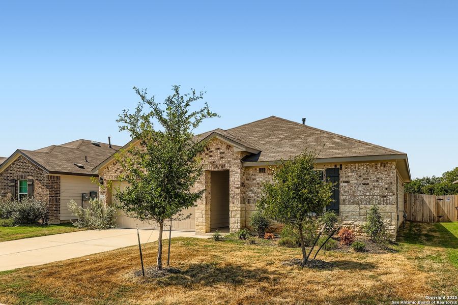 Front exterior of a new home in , New Braunfels, TX, highlighting curb appeal (Image 2). Front exterior of a new home in , New Braunfels, TX, highlighting curb appeal (Image 2).