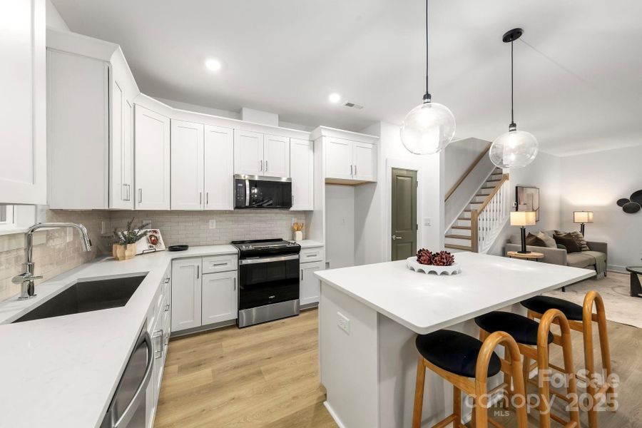 Furnished interior view inside a new home in , Charlotte (Image 8). Furnished interior view inside a new home in , Charlotte (Image 8).